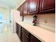 Kitchen features ample counter space and dark wood cabinets at 212 Thomaston Ave, Summerville, SC 29485