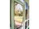 Ornate screen door leading to a spacious backyard at 212 Thomaston Ave, Summerville, SC 29485
