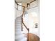 Elegant wooden staircase with a white railing leading to the second floor at 212 Thomaston Ave, Summerville, SC 29485