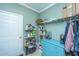 Organized storage room with shelving and dresser at 2136 Promenade Ct, Mount Pleasant, SC 29466