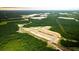 Aerial view of new home community development featuring lots and ponds at 215 Terrace View Dr, Summerville, SC 29486