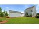 This home features a great backyard, with a lovely screened in porch and green grass at 215 Terrace View Dr, Summerville, SC 29486