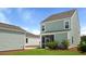This home features a great backyard, with a lovely screened in porch and green grass at 215 Terrace View Dr, Summerville, SC 29486