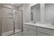 Bathroom boasts a tiled shower with a glass door and a double sink vanity with ample counter space at 215 Terrace View Dr, Summerville, SC 29486