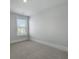 Bedroom features neutral carpet and a window with natural light at 215 Terrace View Dr, Summerville, SC 29486