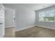 Bright bedroom features wood-look flooring and a window with natural light at 215 Terrace View Dr, Summerville, SC 29486