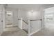 Hallway area with neutral carpet and access to bathroom and bedroom at 215 Terrace View Dr, Summerville, SC 29486