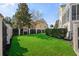 Spacious backyard with lush grass and a game area at 217 Old Hickory Xing, Johns Island, SC 29455