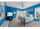 Blue bedroom with a king-size bed and access to a private balcony at 217 Old Hickory Xing, Johns Island, SC 29455