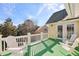 Spacious deck with white chairs, offering scenic views at 217 Old Hickory Xing, Johns Island, SC 29455