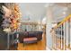 Bright and airy entryway with hardwood floors and staircase at 217 Old Hickory Xing, Johns Island, SC 29455