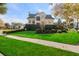 Beautiful two-story home with manicured lawn and landscaping at 217 Old Hickory Xing, Johns Island, SC 29455