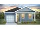 Charming one-story craftsman home with gray siding, white trim, and a two-car garage at 217 Terrace View Dr, Summerville, SC 29486