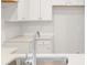 Modern kitchen with white cabinets and a stainless steel sink at 217 Terrace View Dr, Summerville, SC 29486