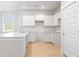 Bright kitchen featuring white cabinets and quartz countertops at 217 Terrace View Dr, Summerville, SC 29486