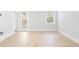 Light and airy living room with hardwood floors and access to a patio at 217 Terrace View Dr, Summerville, SC 29486