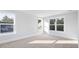 Bright bedroom with carpet flooring and multiple windows at 219 Terrace View Dr, Summerville, SC 29486