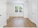 Bright living room with hardwood floors and white walls at 219 Terrace View Dr, Summerville, SC 29486