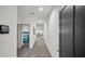 Bright hallway with wood-look floors and access to bedrooms at 221 Terrace View Dr, Summerville, SC 29486