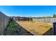 Fenced backyard with grassy area at 234 Swamp Creek Ln, Moncks Corner, SC 29461