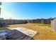 Fenced backyard with a patio and some dry grass at 234 Swamp Creek Ln, Moncks Corner, SC 29461