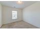 Spacious bedroom with window and neutral carpeting at 234 Swamp Creek Ln, Moncks Corner, SC 29461
