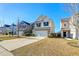 Two-story house with attached garage and landscaping at 234 Swamp Creek Ln, Moncks Corner, SC 29461