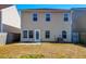 Two story house back view with backyard at 234 Swamp Creek Ln, Moncks Corner, SC 29461