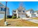 Two story house front view with driveway at 234 Swamp Creek Ln, Moncks Corner, SC 29461