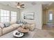 Bright living room with beige sectional sofa and coffee table at 234 Swamp Creek Ln, Moncks Corner, SC 29461