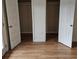 Spacious bedroom closet with double doors and laminate wood flooring at 292 Fleming Rd # C, Charleston, SC 29412