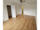 Bedroom with hardwood floors, an open closet, and access to another room at 292 Fleming Rd # C, Charleston, SC 29412