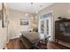 Dining room features a large wooden table, chandelier, and access to the backyard at 302 Damascus Dr, Summerville, SC 29483