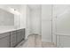 Elegant bathroom with double vanity, gray cabinets, and a large walk-in shower at 349 Trailmore Ln, Summerville, SC 29486