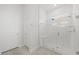 Clean bathroom with a walk-in shower, tile flooring, and a single window at 349 Trailmore Ln, Summerville, SC 29486