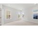 Spacious bedroom with neutral carpeting and multiple windows providing natural light at 349 Trailmore Ln, Summerville, SC 29486