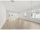 Open concept dining room with hardwood flooring and lots of natural light at 349 Trailmore Ln, Summerville, SC 29486