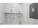 Laundry room with white cabinets and hookups for a washer and dryer at 349 Trailmore Ln, Summerville, SC 29486
