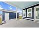 Covered patio with blue ceiling and access to a detached garage at 349 Trailmore Ln, Summerville, SC 29486