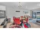 Dining area with red chairs and a glass-top table at 396 Painted Lady Ln, Goose Creek, SC 29445
