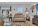 Bright living room with sliding glass doors leading to a patio at 396 Painted Lady Ln, Goose Creek, SC 29445