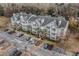 Aerial view of apartment buildings with ample parking at 45 Sycamore Ave # 523, Charleston, SC 29407
