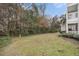 Private backyard with green space and mature trees at 45 Sycamore Ave # 523, Charleston, SC 29407