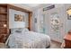 Guest bedroom with a murphy bed and balcony access at 45 Sycamore Ave # 523, Charleston, SC 29407