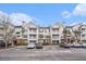 Three-story building with brick and siding, balconies, and parking lot at 45 Sycamore Ave # 523, Charleston, SC 29407