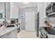 Modern kitchen with stainless steel appliances and granite countertops at 45 Sycamore Ave # 523, Charleston, SC 29407