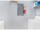 Laundry room with washer, dryer, and storage shelving at 45 Sycamore Ave # 523, Charleston, SC 29407