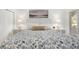 Bright bedroom with a floral comforter and white nightstands at 4545 Park Lake Dr, Kiawah Island, SC 29455