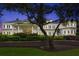 Grand home with stately columns and landscaping at 4545 Park Lake Dr, Kiawah Island, SC 29455