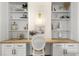 Built-in shelves and a desk create a functional home office at 4545 Park Lake Dr, Kiawah Island, SC 29455
